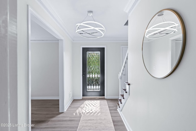 5515 Hempstead Rd, Louisville, KY 40207 - foyer with a chandelier, stairs, wood finished floors, and ornamental molding