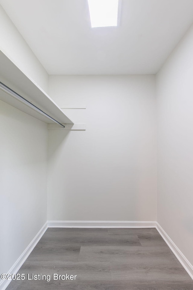 5515 Hempstead Rd, Louisville, KY 40207 - walk in closet with dark wood finished floors