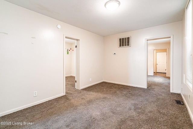 2113 Willow St, New Albany, IN 47150 - carpeted spare room with baseboards and a smoke detector