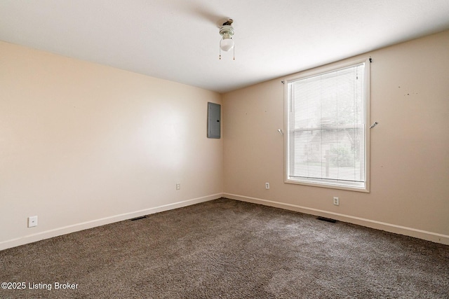 2113 Willow St, New Albany, IN 47150 - spare room featuring electric panel and dark colored carpet