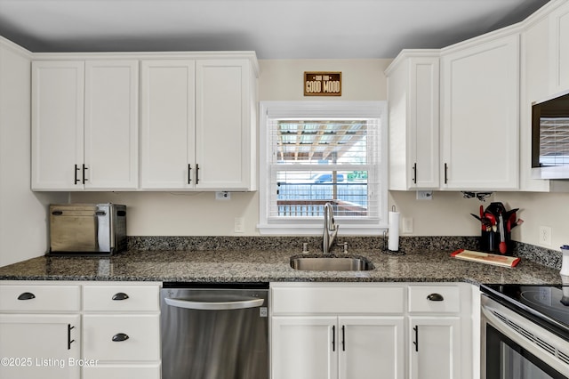 3408 Acacia Ave, Shepherdsville, KY 40165 - kitchen featuring appliances with stainless steel finishes, white cabinetry, and dark stone counters