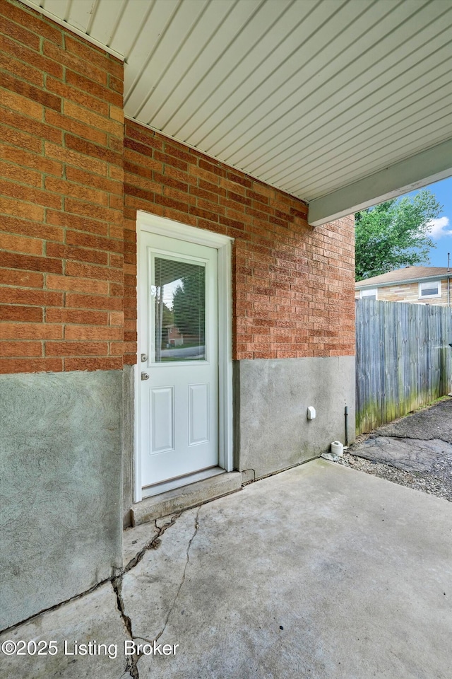 3408 Acacia Ave, Shepherdsville, KY 40165 - doorway to property with brick siding and a patio area