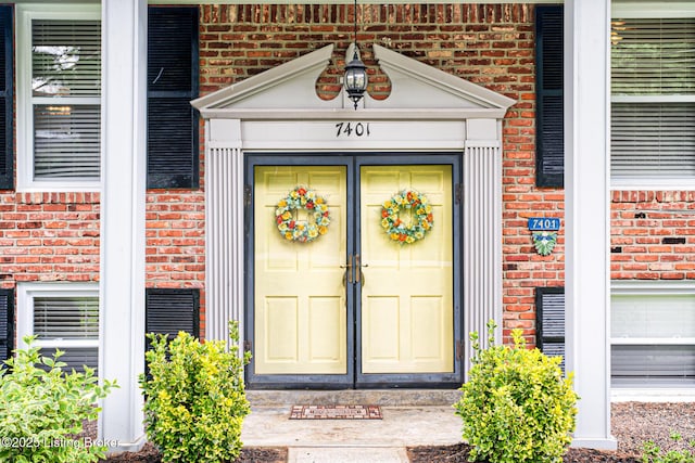 7401 Switch Bark Rd, Louisville, KY 40228 - doorway to property with brick siding