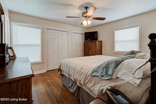 7401 Switch Bark Rd, Louisville, KY 40228 - bedroom featuring wood finished floors, multiple closets, and ceiling fan