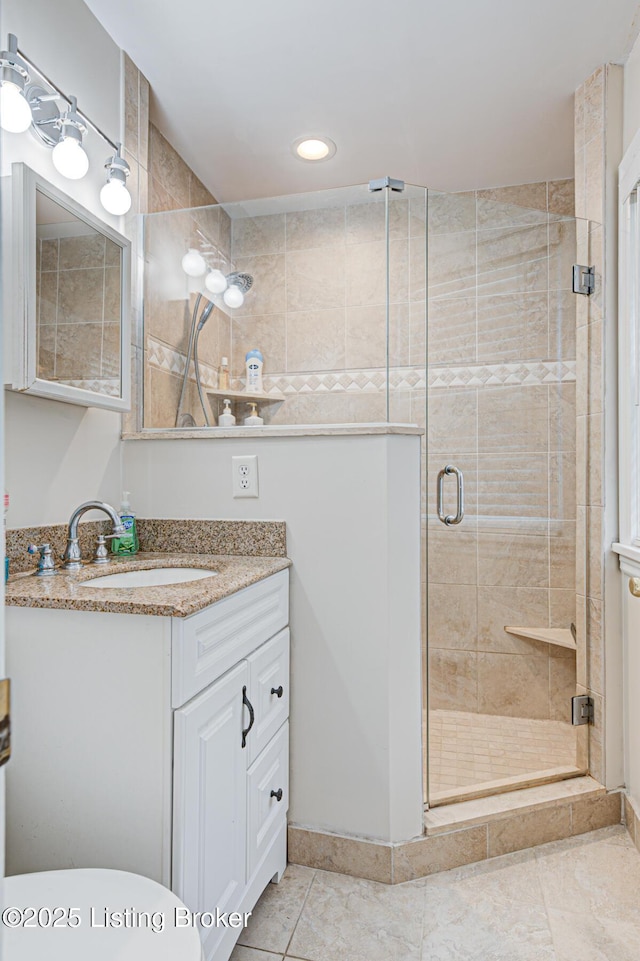 7401 Switch Bark Rd, Louisville, KY 40228 - full bathroom with vanity, a shower stall, tile patterned floors, and recessed lighting