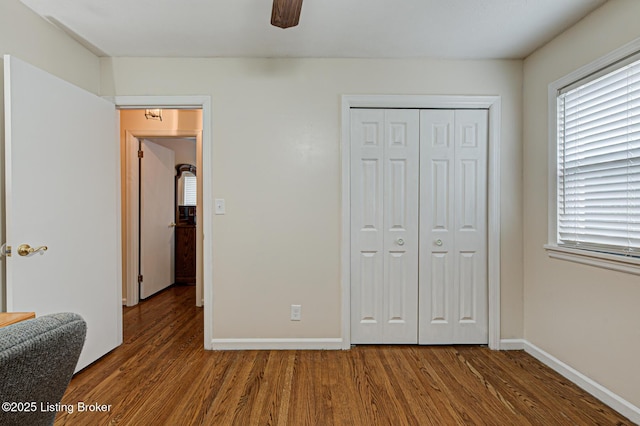 7401 Switch Bark Rd, Louisville, KY 40228 - bedroom with wood finished floors, a closet, multiple windows, and a ceiling fan