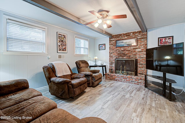 7401 Switch Bark Rd, Louisville, KY 40228 - living room featuring wood finished floors, ceiling fan, a fireplace, and beam ceiling