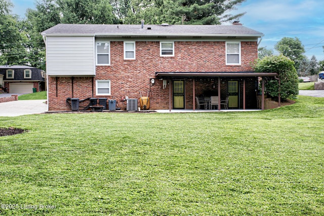 7401 Switch Bark Rd, Louisville, KY 40228 - back of property with a yard, brick siding, and a patio