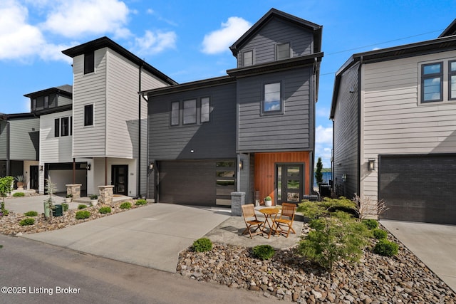 104 Howard Ln, Jeffersonville, IN 47130 - contemporary house featuring driveway and a garage