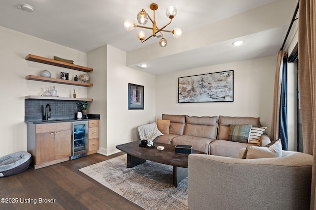 104 Howard Ln, Jeffersonville, IN 47130 - living room featuring beverage cooler, dark wood finished floors, bar area, a chandelier, and recessed lighting