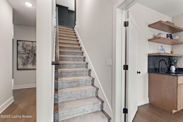 104 Howard Ln, Jeffersonville, IN 47130 - staircase featuring wood finished floors, recessed lighting, and bar