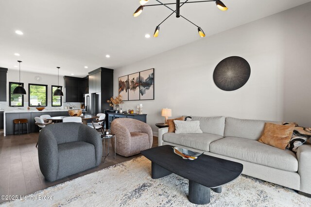 104 Howard Ln, Jeffersonville, IN 47130 - living area featuring recessed lighting, light wood-style floors, and a chandelier
