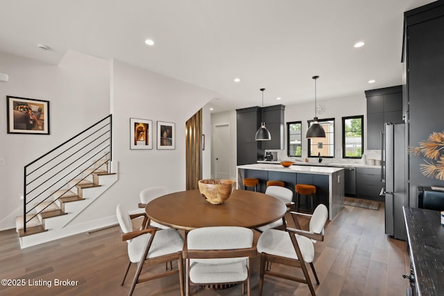 104 Howard Ln, Jeffersonville, IN 47130 - dining area with wood finished floors, stairway, and recessed lighting