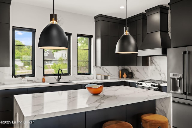 104 Howard Ln, Jeffersonville, IN 47130 - kitchen featuring modern cabinets, dark cabinetry, stainless steel appliances, custom range hood, and healthy amount of natural light