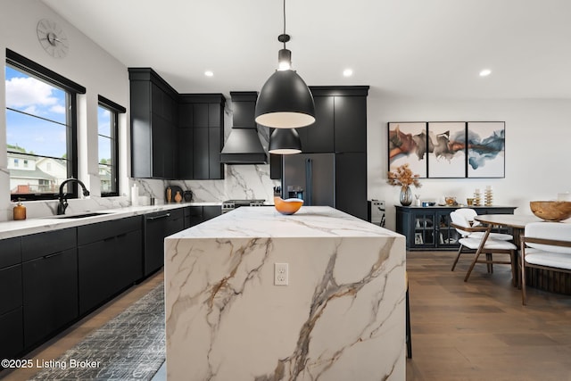 104 Howard Ln, Jeffersonville, IN 47130 - kitchen with dark cabinetry, custom exhaust hood, a center island, pendant lighting, and recessed lighting