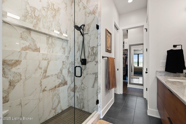 104 Howard Ln, Jeffersonville, IN 47130 - full bathroom featuring a marble finish shower, vanity, and tile patterned flooring
