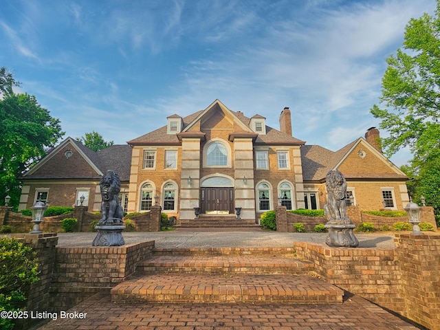 3501 Trinidad Ct, Lexington, KY 40509 - colonial-style house with a chimney and brick siding