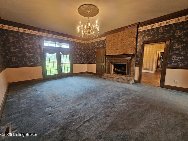 3501 Trinidad Ct, Lexington, KY 40509 - unfurnished living room featuring wallpapered walls, a chandelier, french doors, carpet floors, and wainscoting