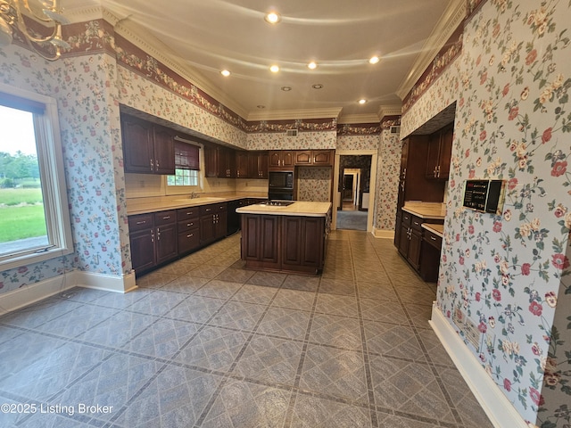 3501 Trinidad Ct, Lexington, KY 40509 - kitchen with crown molding, wallpapered walls, light countertops, healthy amount of natural light, and a center island