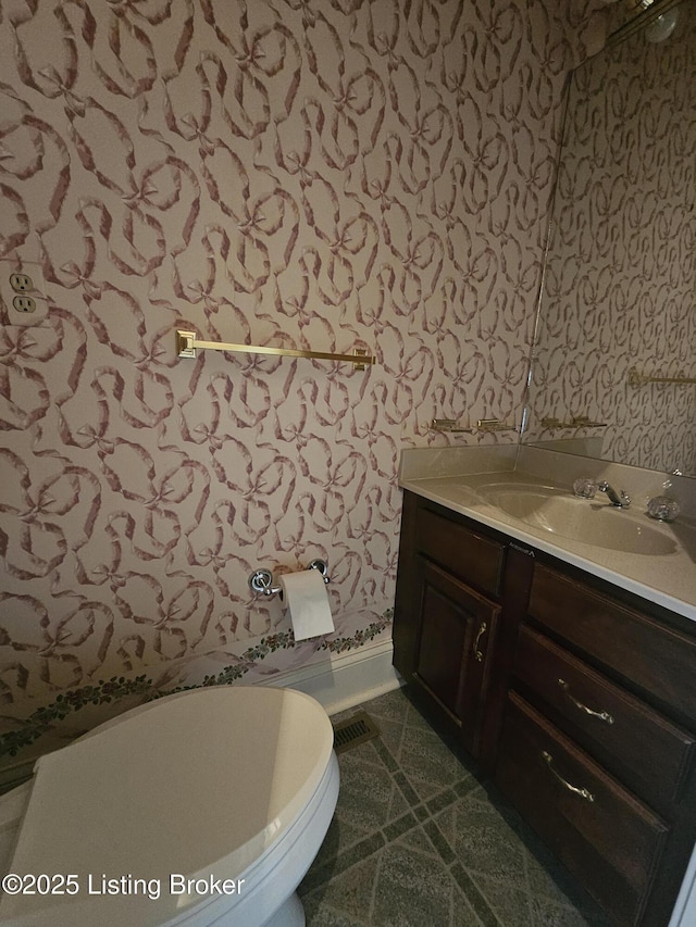 3501 Trinidad Ct, Lexington, KY 40509 - bathroom featuring wallpapered walls and vanity