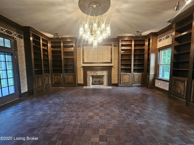 3501 Trinidad Ct, Lexington, KY 40509 - unfurnished living room with built in shelves, a chandelier, and a fireplace