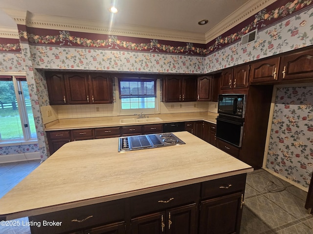 3501 Trinidad Ct, Lexington, KY 40509 - kitchen featuring black appliances, wallpapered walls, light countertops, a kitchen island, and healthy amount of natural light