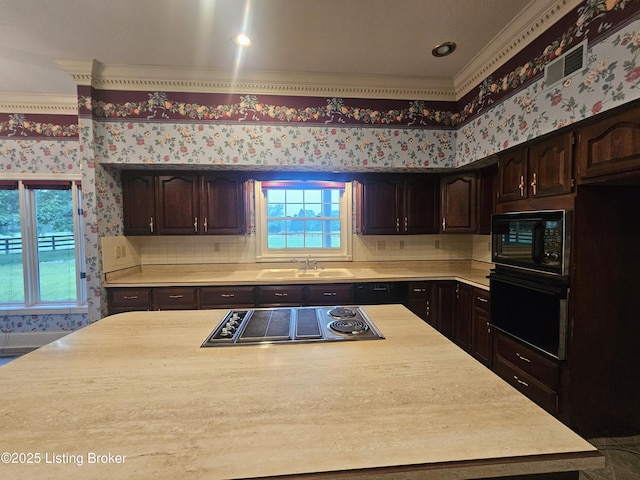3501 Trinidad Ct, Lexington, KY 40509 - kitchen featuring black appliances, light countertops, wallpapered walls, a kitchen island, and dark brown cabinets