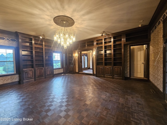 3501 Trinidad Ct, Lexington, KY 40509 - unfurnished living room with built in shelves and a chandelier