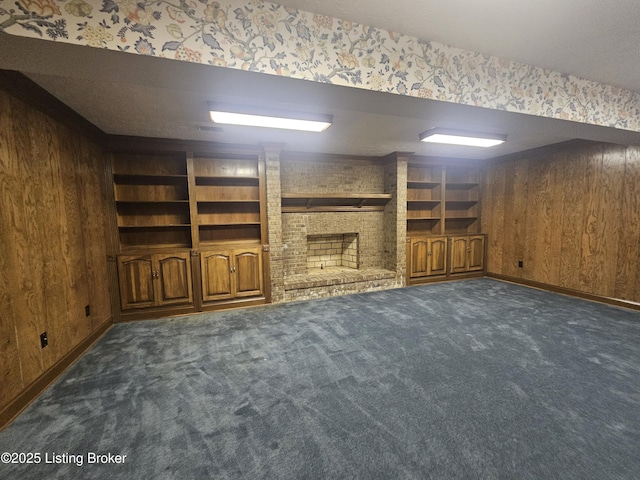 3501 Trinidad Ct, Lexington, KY 40509 - unfurnished living room with wood walls, built in features, a brick fireplace, and carpet