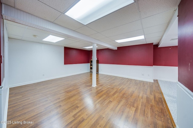 8415 Hurstbourne Woods Pl, Louisville, KY 40299 - finished basement featuring a drop ceiling, wood finished floors, and wainscoting
