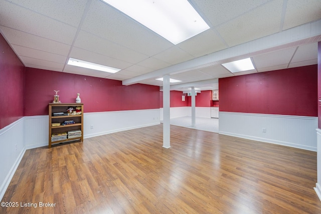 8415 Hurstbourne Woods Pl, Louisville, KY 40299 - finished basement featuring a paneled ceiling, wainscoting, and wood finished floors