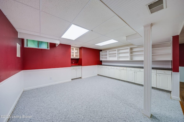 8415 Hurstbourne Woods Pl, Louisville, KY 40299 - below grade area with carpet floors, wainscoting, and a drop ceiling