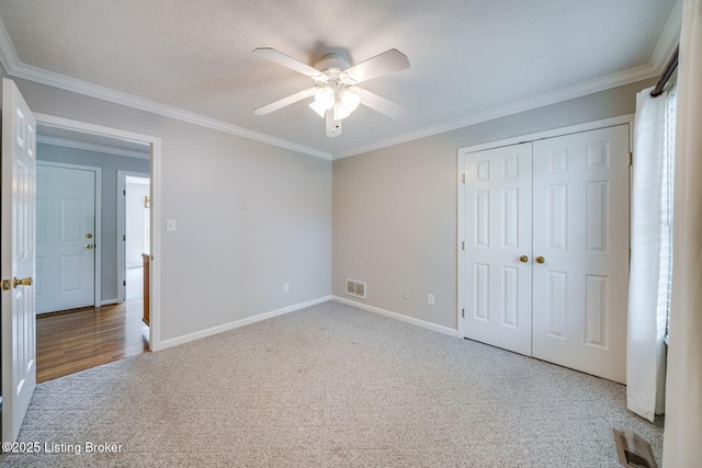8415 Hurstbourne Woods Pl, Louisville, KY 40299 - unfurnished bedroom with carpet floors, crown molding, a closet, and ceiling fan