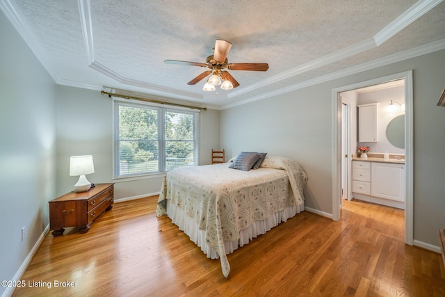 8415 Hurstbourne Woods Pl, Louisville, KY 40299 - bedroom with a textured ceiling, light wood-style floors, crown molding, connected bathroom, and ceiling fan