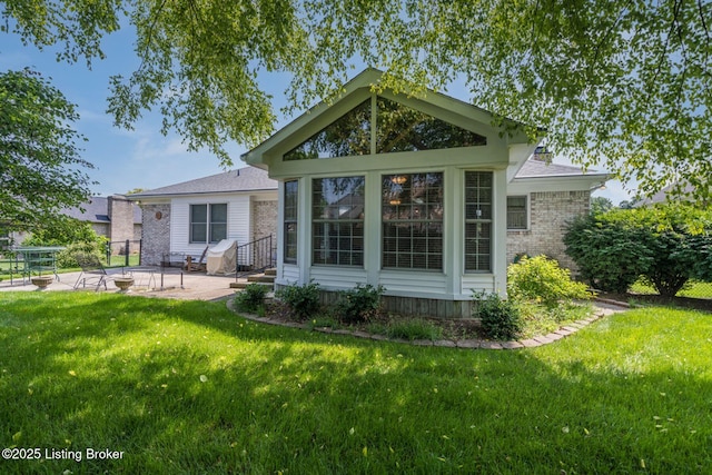 8415 Hurstbourne Woods Pl, Louisville, KY 40299 - back of house featuring a patio and brick siding