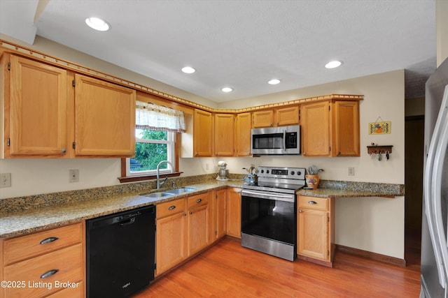 79 Meadow Lake Dr, Taylorsville, KY 40071 - kitchen with stainless steel appliances, light wood-type flooring, recessed lighting, and light stone counters