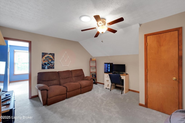 79 Meadow Lake Dr, Taylorsville, KY 40071 - living area with ceiling fan, carpet floors, vaulted ceiling, an office area, and a textured ceiling
