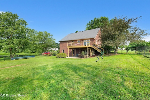 79 Meadow Lake Dr, Taylorsville, KY 40071 - back of house with stairway, a wooden deck, a fenced backyard, and a patio area