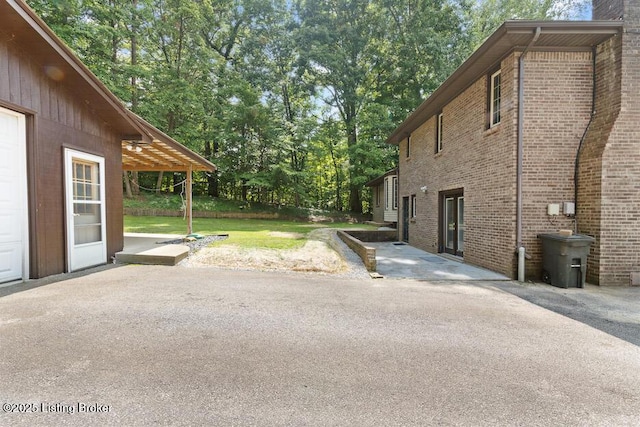 2312 Blevins Gap Rd, Louisville, KY 40272 - view of patio with view of wooded area