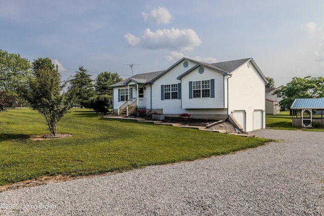 95 Sunny Meadows Dr, Vine Grove, KY 40175 - ranch-style home with driveway, an attached garage, and a front yard