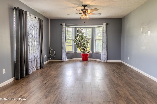 95 Sunny Meadows Dr, Vine Grove, KY 40175 - spare room with ceiling fan, dark wood-style flooring, and a textured ceiling
