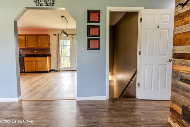 95 Sunny Meadows Dr, Vine Grove, KY 40175 - corridor with wood finished floors and an upstairs landing
