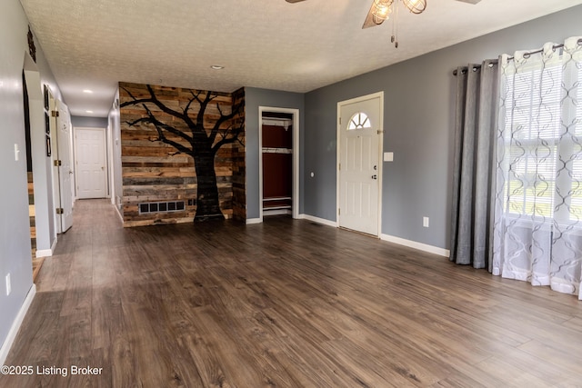95 Sunny Meadows Dr, Vine Grove, KY 40175 - unfurnished living room with ceiling fan, dark wood-style floors, a textured ceiling, and recessed lighting