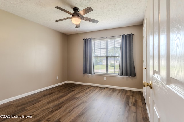 95 Sunny Meadows Dr, Vine Grove, KY 40175 - spare room with dark wood-type flooring, ceiling fan, and a textured ceiling