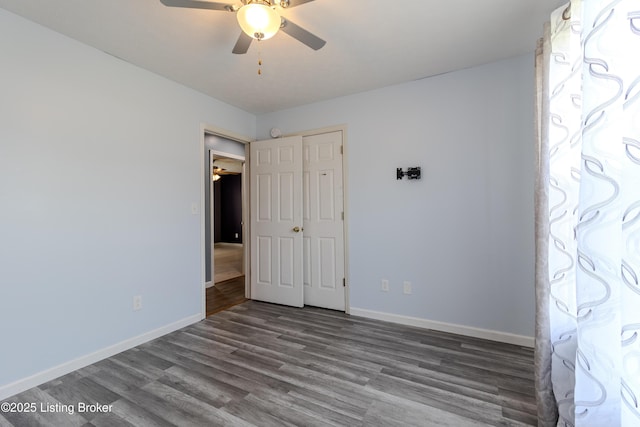 95 Sunny Meadows Dr, Vine Grove, KY 40175 - unfurnished bedroom featuring wood finished floors and a ceiling fan