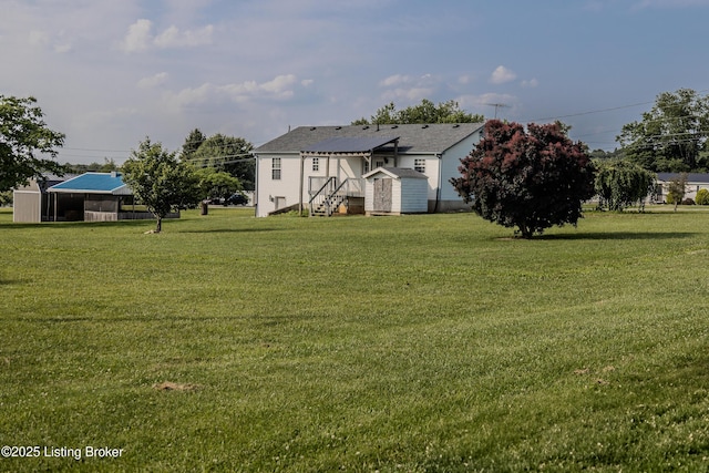 95 Sunny Meadows Dr, Vine Grove, KY 40175 - view of grassy yard with a storage unit