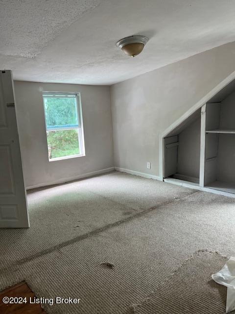 1008 Walter Ave, Louisville, KY 40215 - spare room with carpet flooring and baseboards
