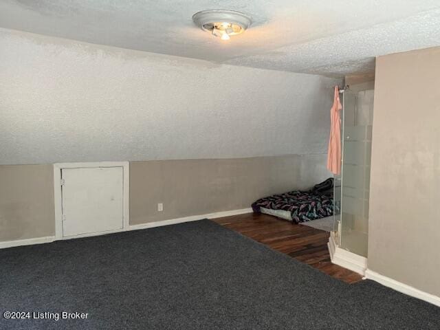 1008 Walter Ave, Louisville, KY 40215 - unfurnished bedroom featuring a textured ceiling and carpet