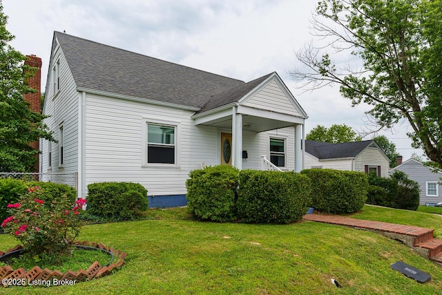 329 Robin Rd, Elizabethtown, KY 42701 - view of front of home with a front lawn and a shingled roof