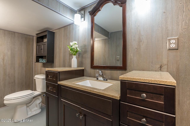 329 Robin Rd, Elizabethtown, KY 42701 - bathroom with vanity and wooden walls